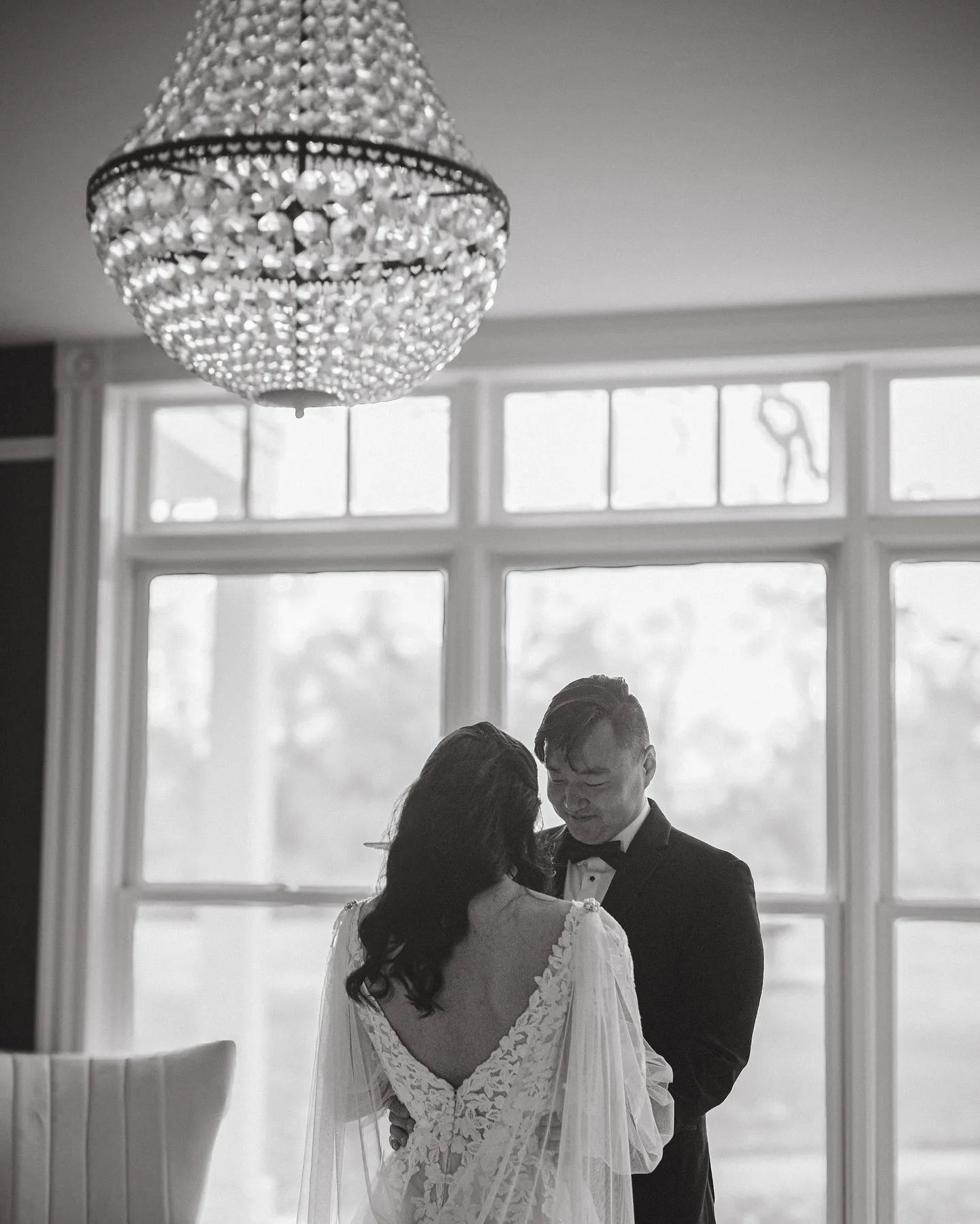 Couple during their first look in soft window light